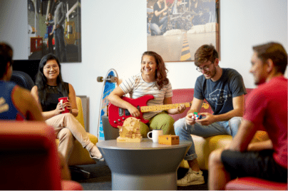 Photo of Iowa State University students socializing in the Student Innovation Center.
